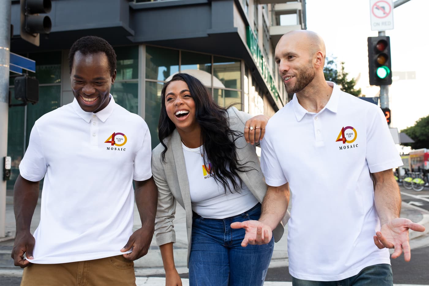 Three laughing people in custom t-shirts